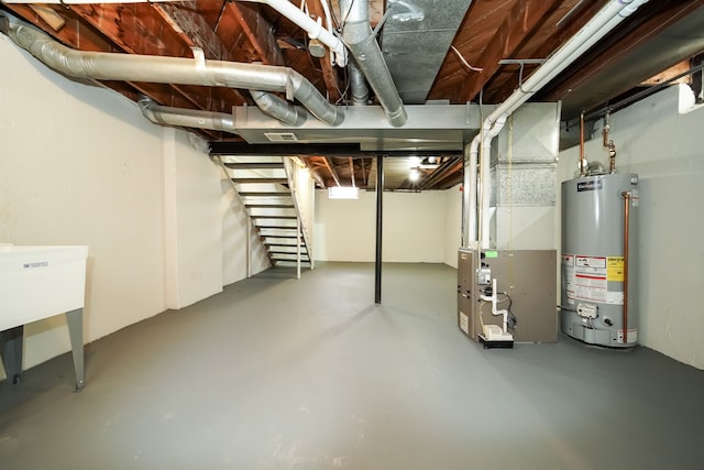 basement with heating unit and water heater