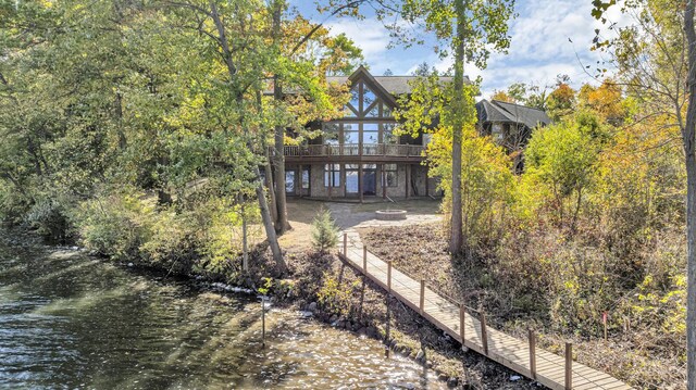 10560 Plaza Ct, Jerome, MI 49249 - rear view of property with a deck with water view