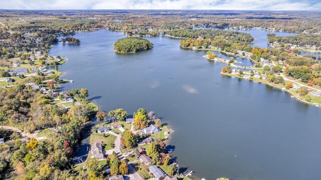 10560 Plaza Ct, Jerome, MI 49249 - view of property location with a nearby body of water and a heavily wooded area