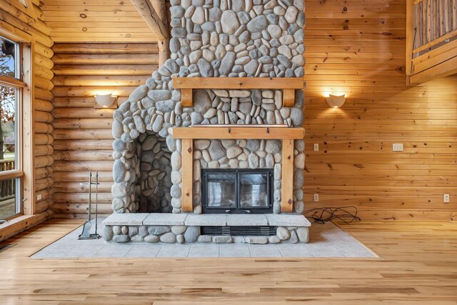 10560 Plaza Ct, Jerome, MI 49249 - detailed view of wood finished floors and a stone fireplace