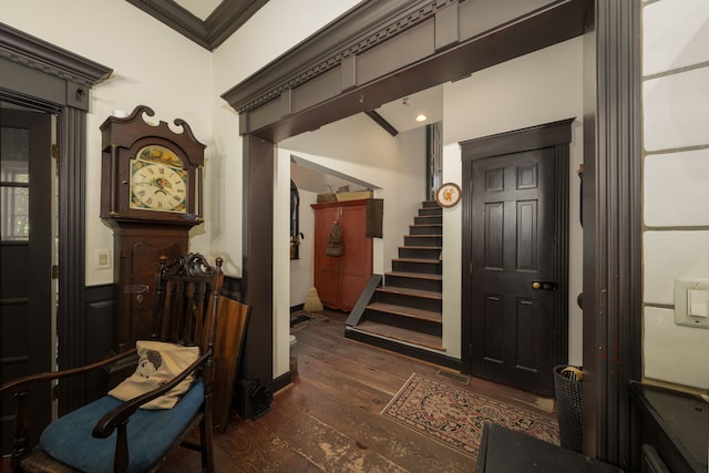 interior space featuring dark hardwood / wood-style flooring and ornamental molding