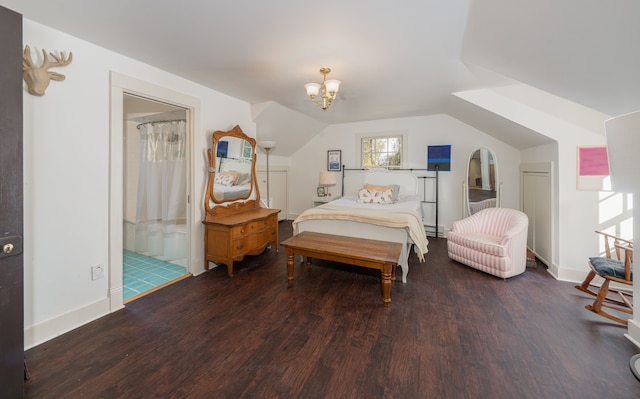 bedroom with a chandelier, ensuite bathroom, vaulted ceiling, and dark hardwood / wood-style floors