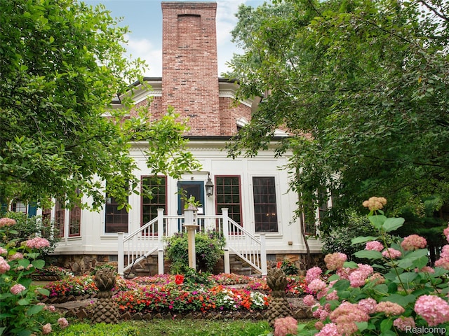 6230 Winkler Mill Rd, Rochester Hills, MI 48306 - back of house featuring a chimney