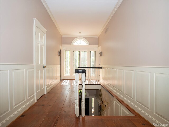 6230 Winkler Mill Rd, Rochester Hills, MI 48306 - hall featuring a decorative wall, ornamental molding, an upstairs landing, wainscoting, and hardwood / wood-style flooring