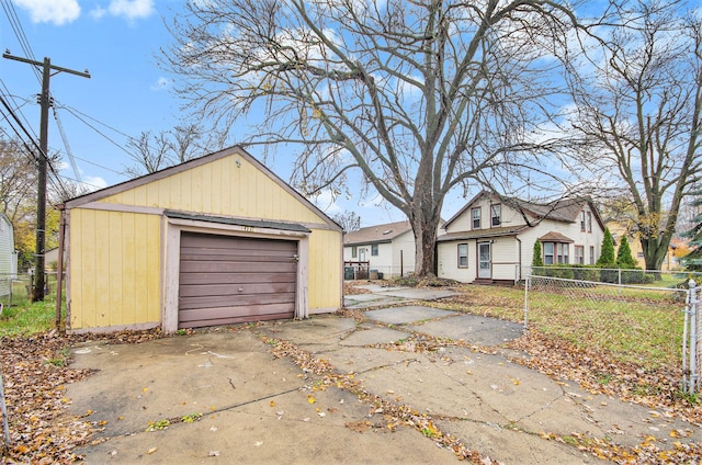 view of front of home with an outbuilding and a garage