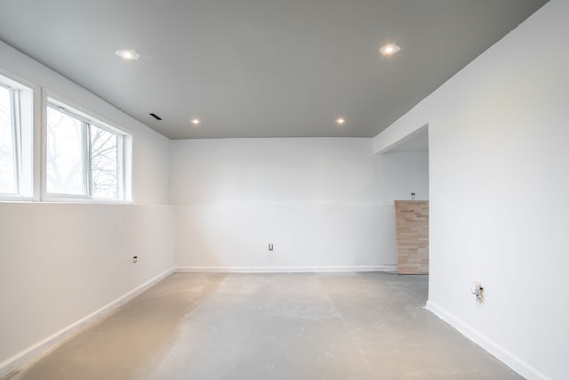 spare room featuring concrete flooring