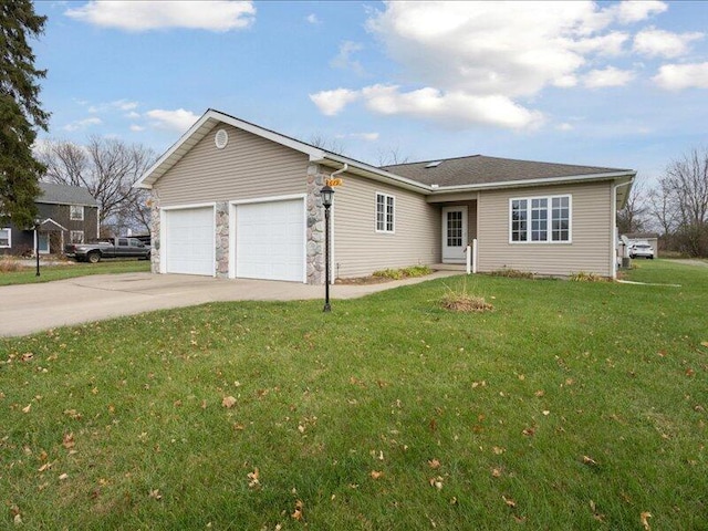 single story home featuring a front yard and a garage