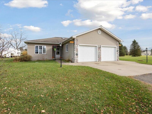 ranch-style house with a garage and a front yard