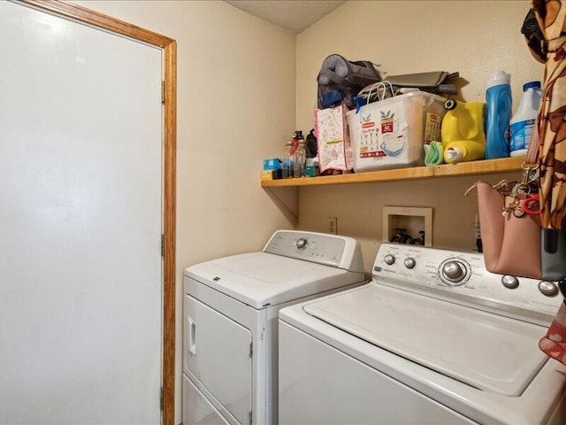 laundry area featuring independent washer and dryer