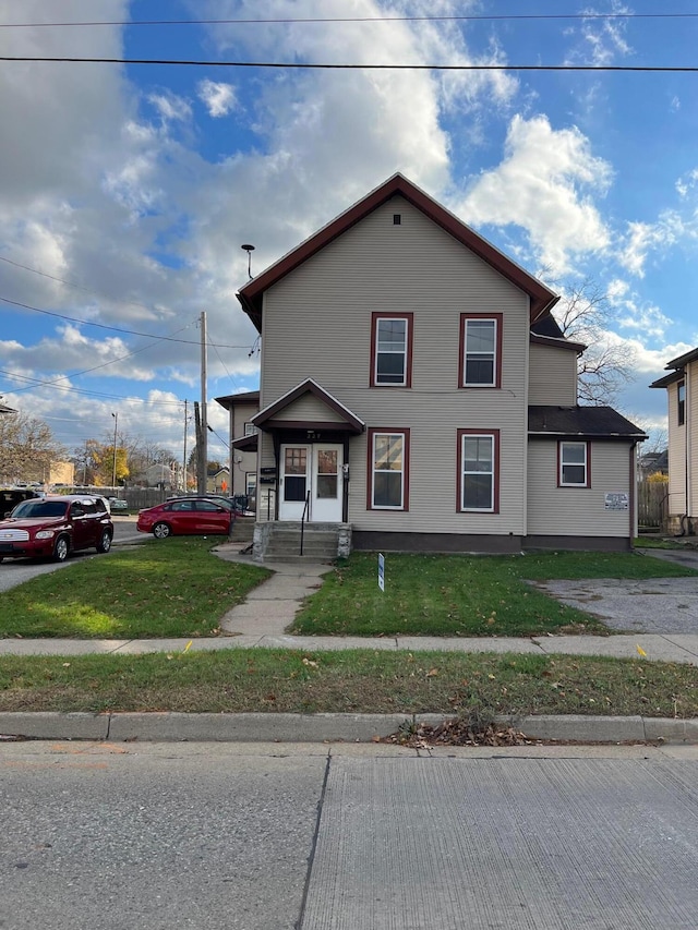 view of front of home with a front yard