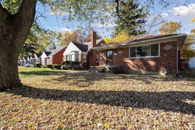 ranch-style house with a front yard