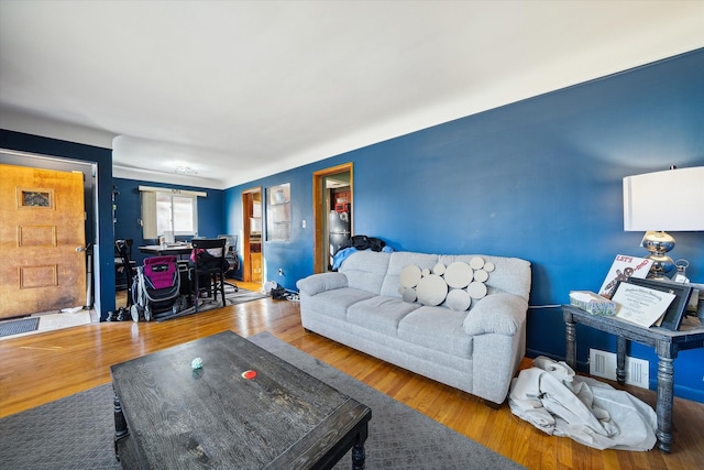 living room with hardwood / wood-style flooring