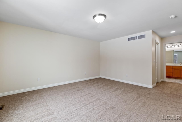 view of carpeted spare room