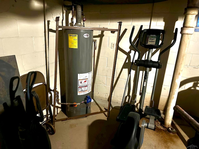 utility room featuring water heater