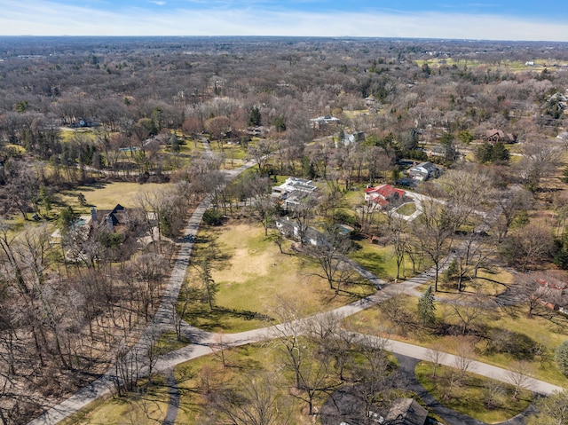 aerial view featuring a view of trees