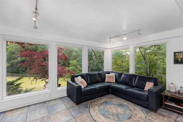 26335 Woodlore Rd, Franklin, MI 48025 - sunroom / solarium featuring rail lighting