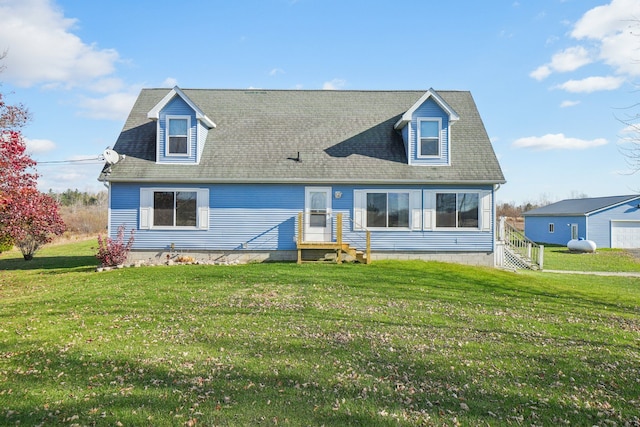 cape cod home with a front yard