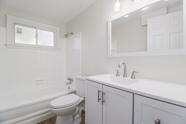 full bathroom featuring shower / tub combination, hardwood / wood-style flooring, vanity, and toilet