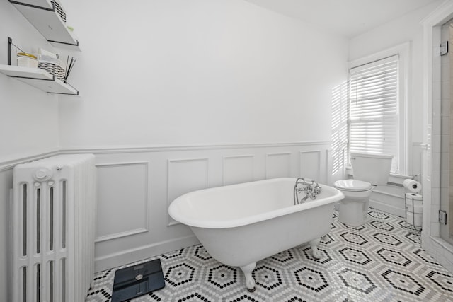 bathroom featuring separate shower and tub, radiator, tile patterned flooring, and toilet