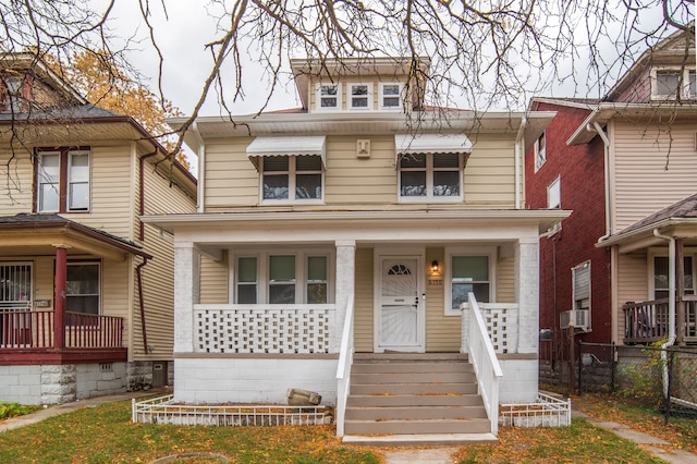 view of front facade featuring cooling unit and a porch