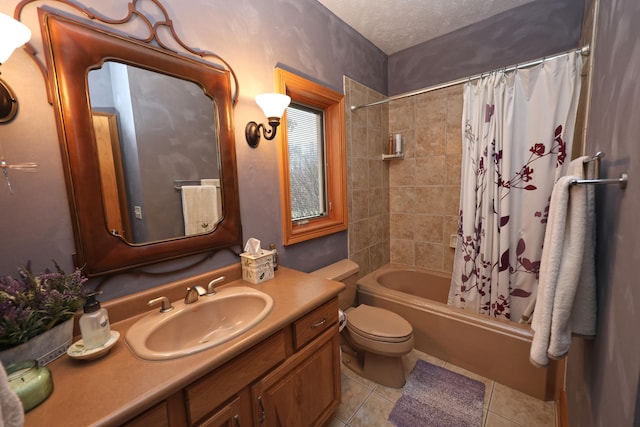 full bathroom with shower / tub combo, tile patterned floors, vanity, a textured ceiling, and toilet