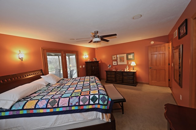 carpeted bedroom featuring access to exterior, ceiling fan, and french doors