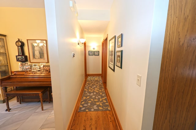 corridor featuring light hardwood / wood-style floors