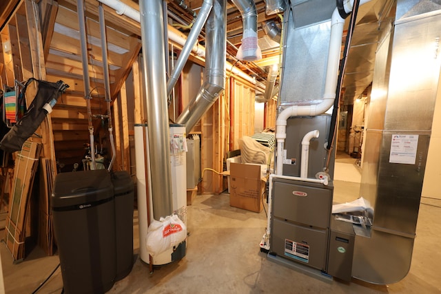 utility room featuring gas water heater