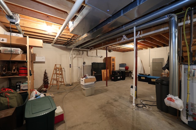 basement featuring water heater