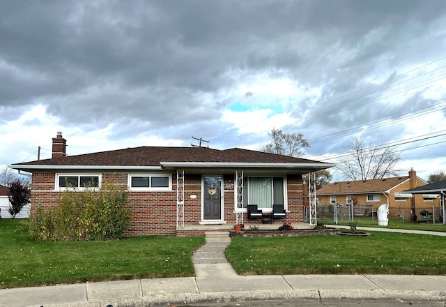 view of front of house with a front lawn