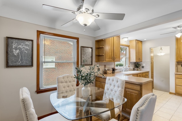 tiled dining area with sink