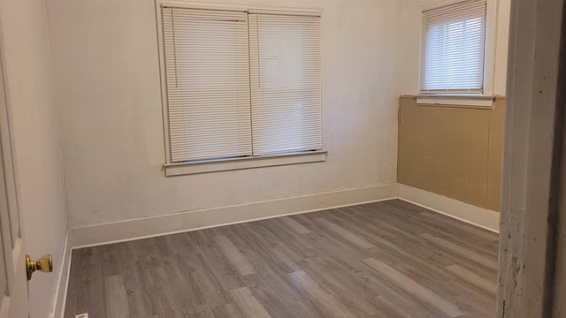 931 Hughes Ave, Flint, MI 48503 - empty room with baseboards and wood finished floors