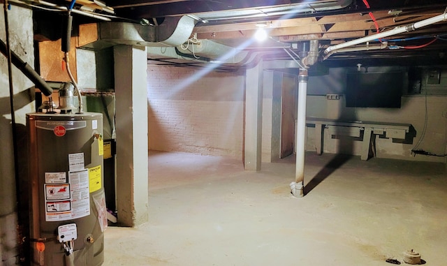 basement featuring gas water heater