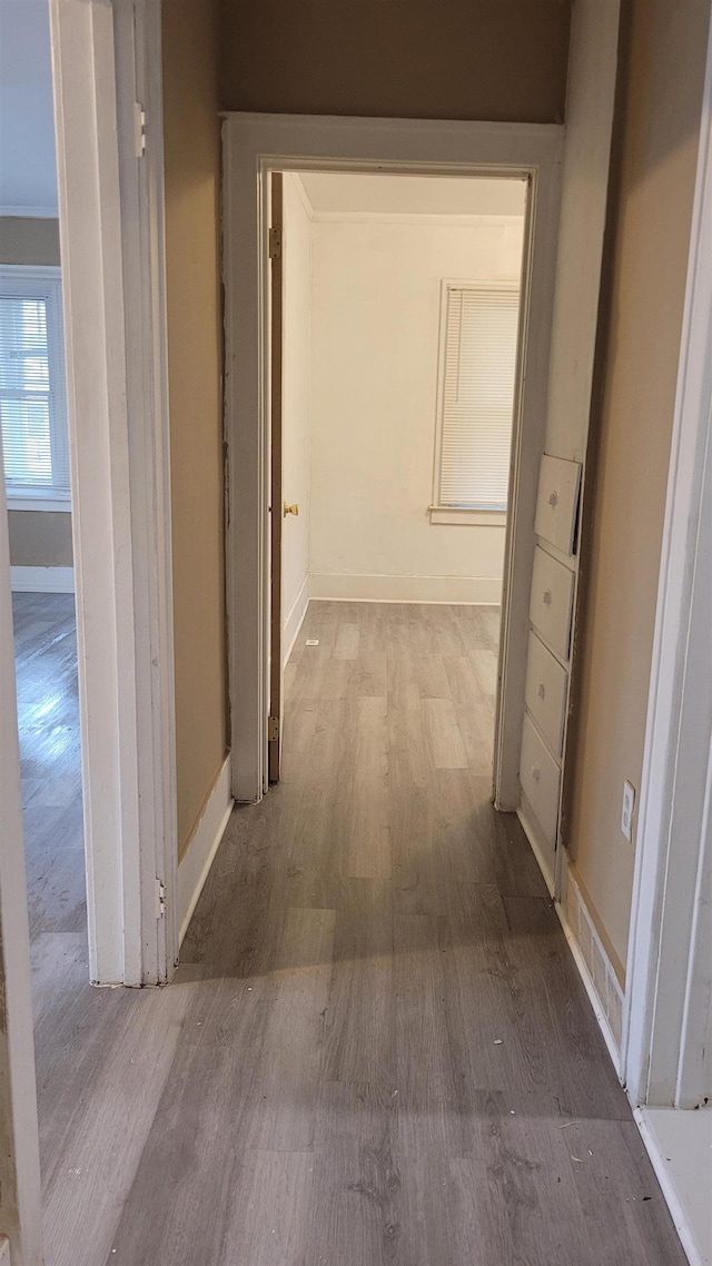 931 Hughes Ave, Flint, MI 48503 - hall featuring wood finished floors and baseboards