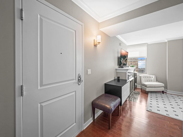 interior space with crown molding and wood-type flooring