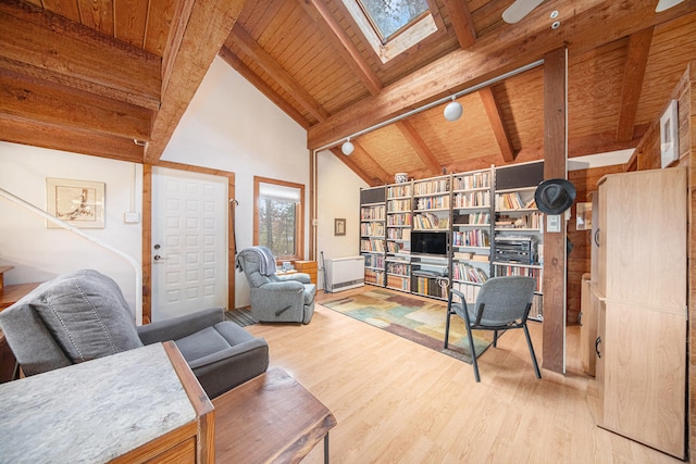 living room featuring a skylight, wood-type flooring, high vaulted ceiling, wooden ceiling, and beamed ceiling