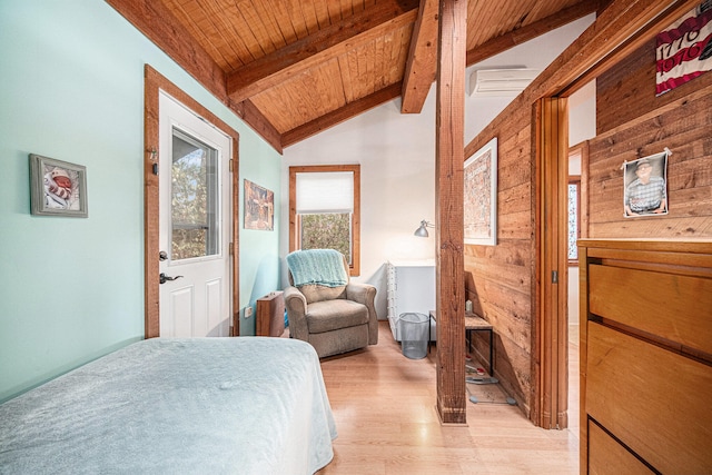 bedroom with vaulted ceiling with beams, wood walls, wooden ceiling, and light hardwood / wood-style flooring