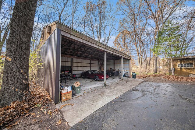 view of car parking with a carport