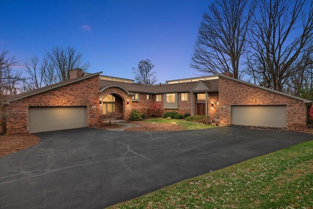 view of front of property featuring a garage