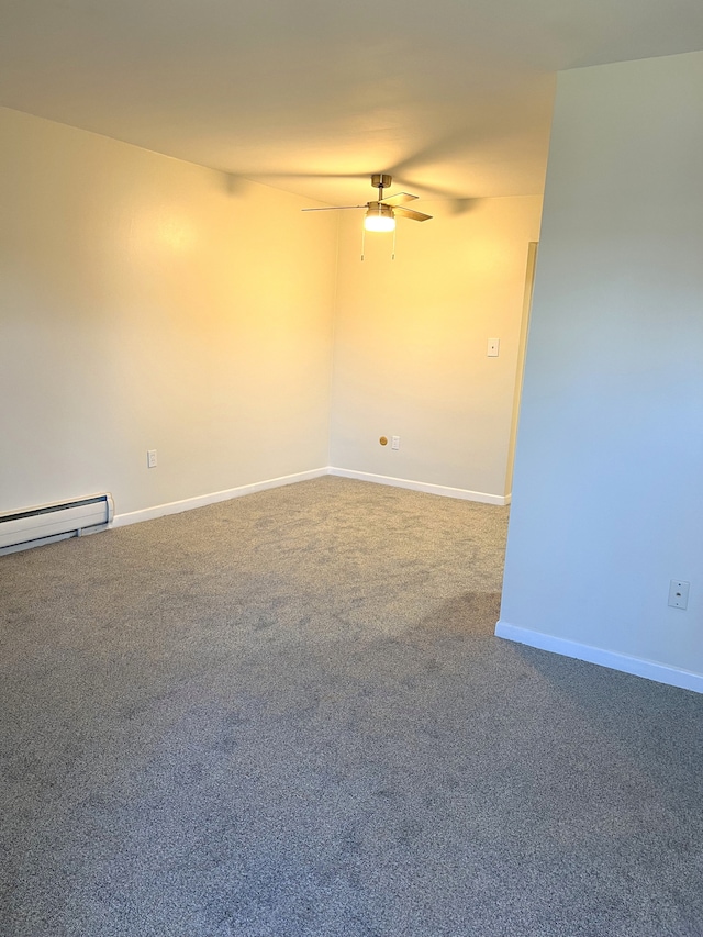 empty room featuring carpet flooring, ceiling fan, and a baseboard radiator