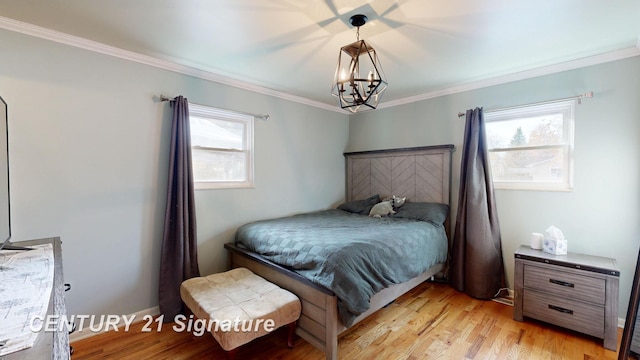 527 Leland St, Flushing, MI 48433 - bedroom with ornamental molding, a chandelier, and light wood-style flooring