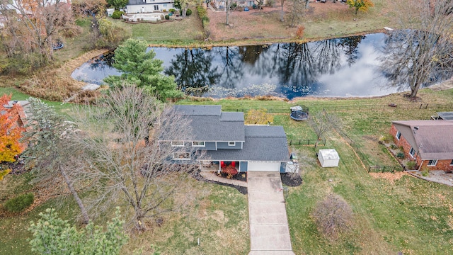 bird's eye view with a water view