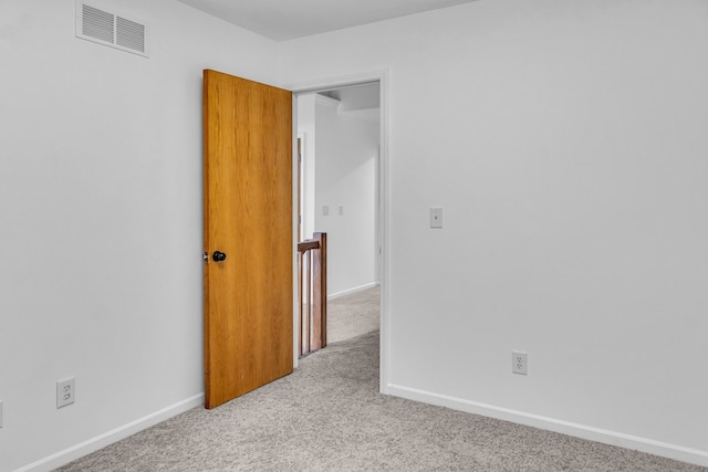 empty room with light carpet