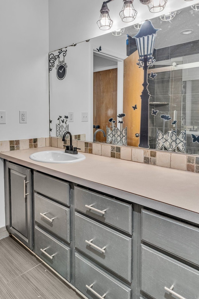 bathroom featuring vanity and walk in shower