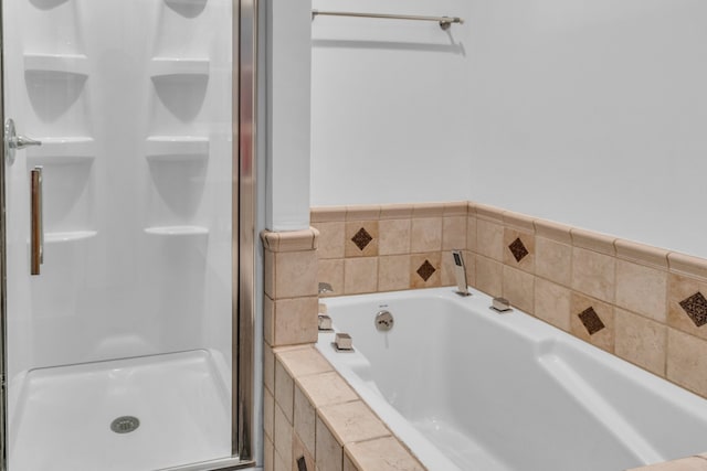 bathroom with independent shower and bath