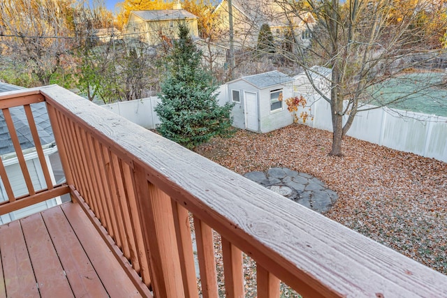 deck with a storage shed