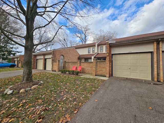 single story home with a garage