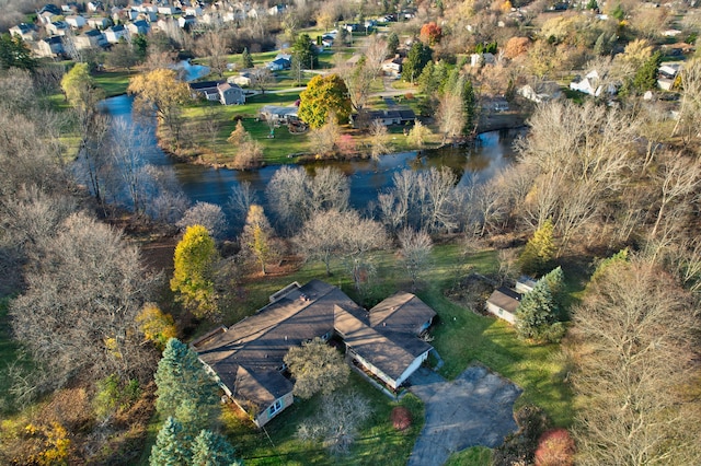 drone / aerial view with a water view