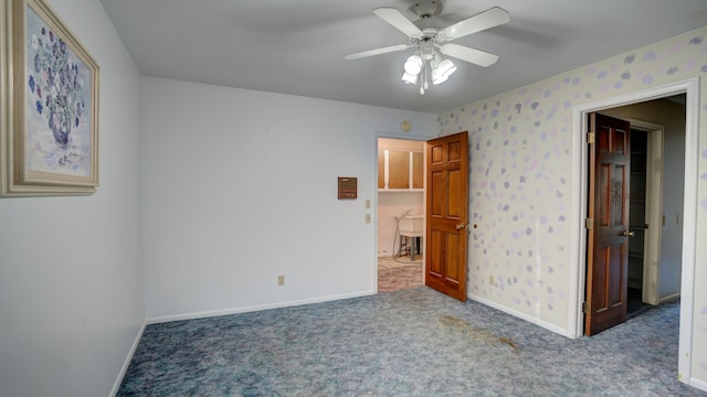 unfurnished bedroom featuring ceiling fan and carpet