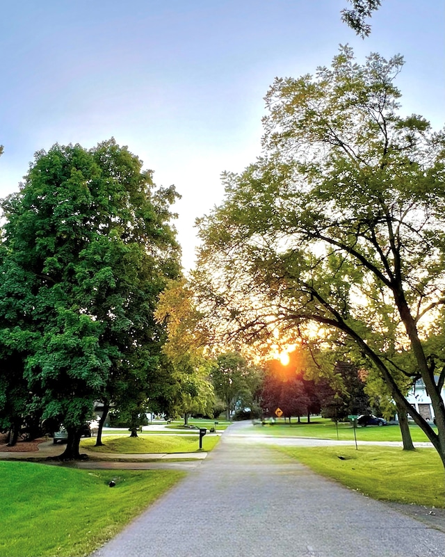 surrounding community featuring a lawn